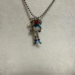 Vintage hand beaded girl figure necklace
